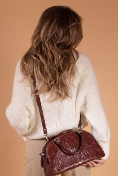 Leather patina shown on vegetable-tanned leather bag