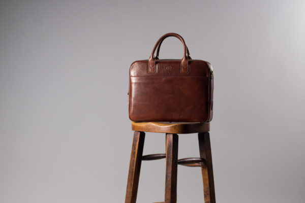 what makes a good leather briefcase shown through Calvino business bag in chestnut tan