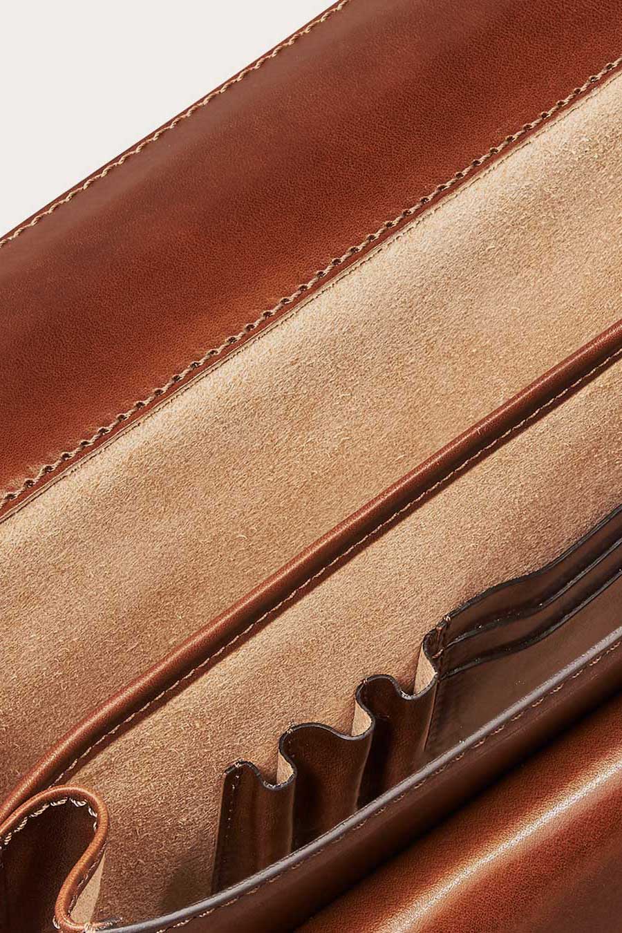 Work satchel for professionals with durable raw leather lining
