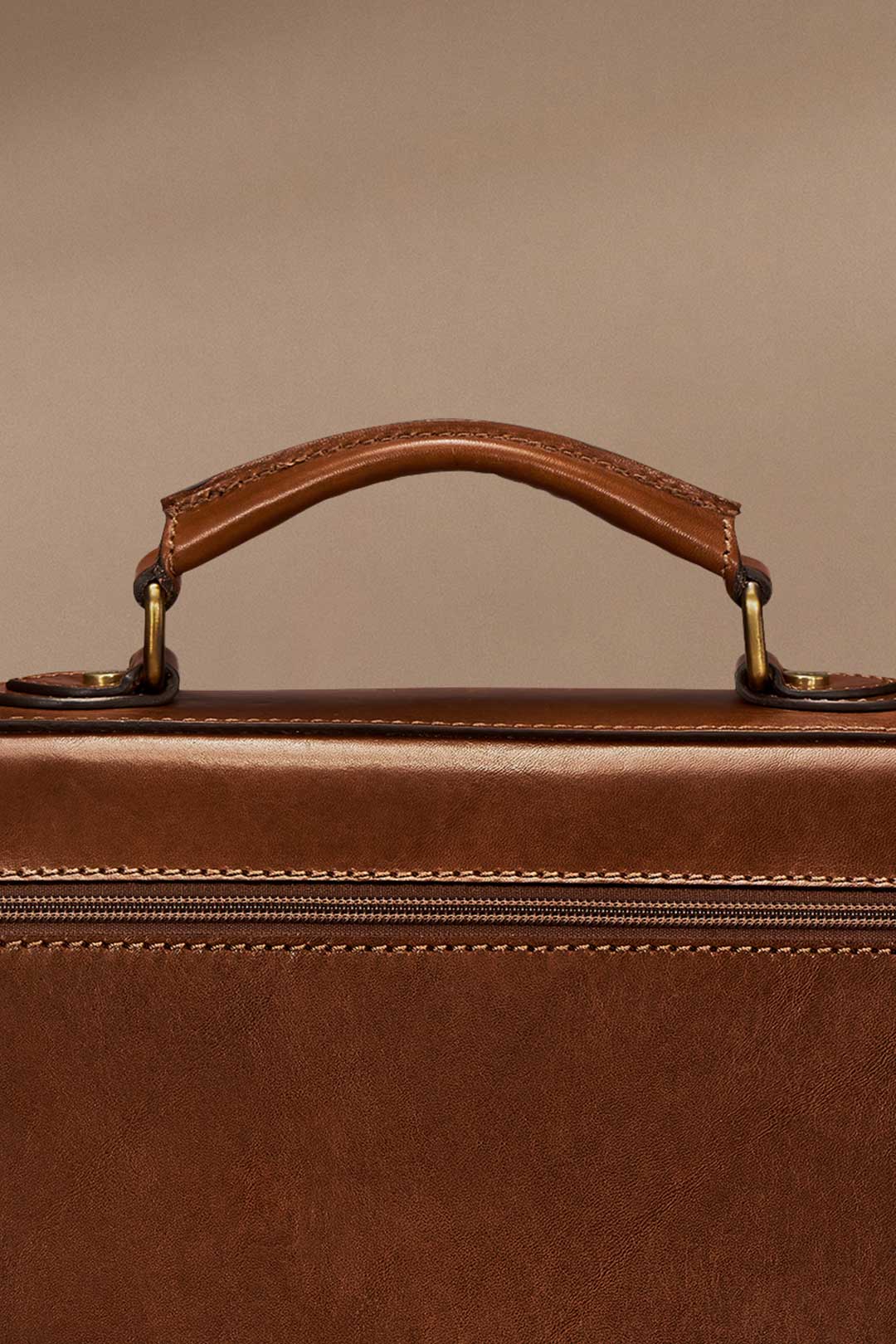 Work satchel for professionals with leather handle and shoulder strap