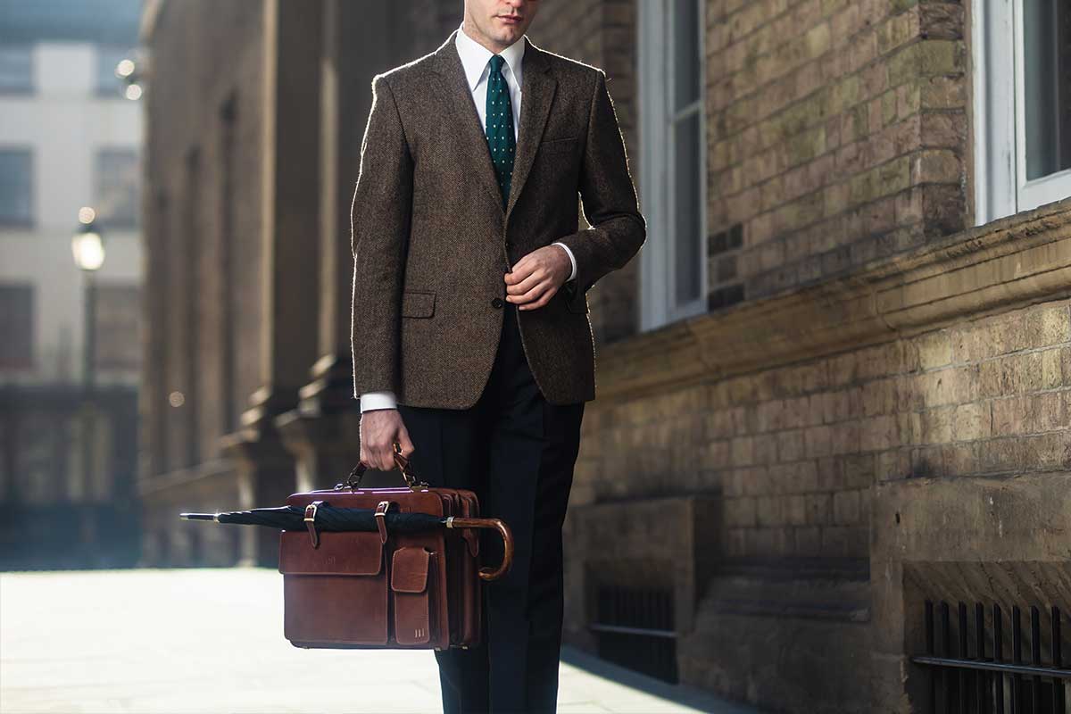 Alanzo briefcase structured leather briefcase with man in suit showcasing modern silhouette