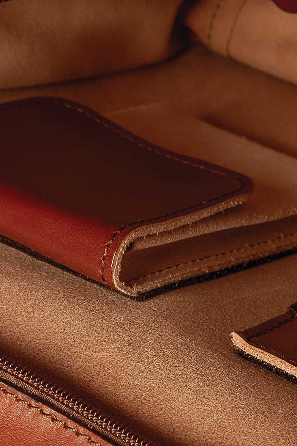 Structured leather briefcase interior detailing Italian leather briefcase craftsmanship