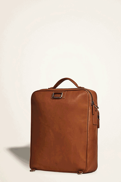 Comfort grip handle on extra large leather business backpack