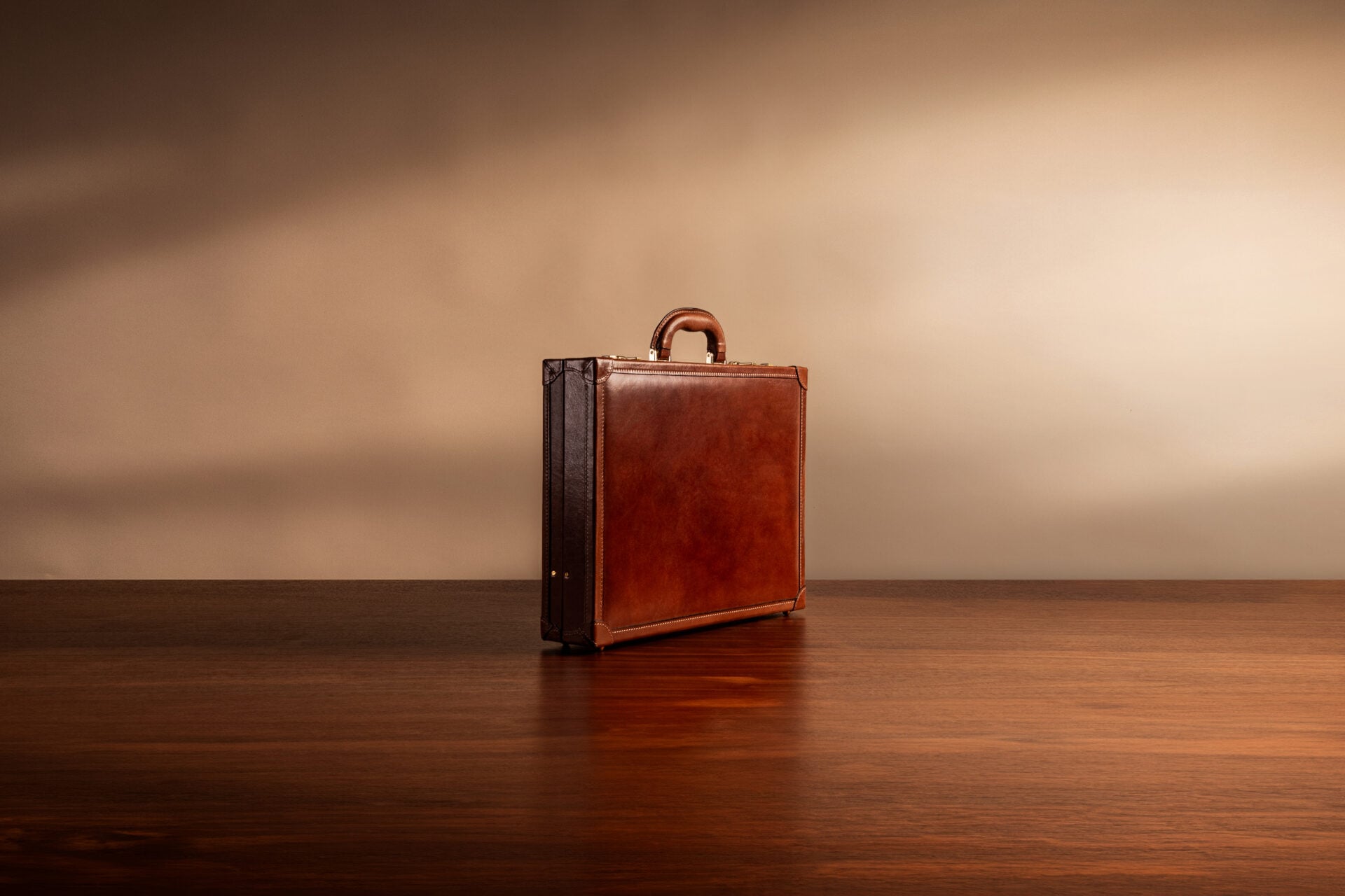 Front view of the Scanno attaché case showcasing its traditional silhouette